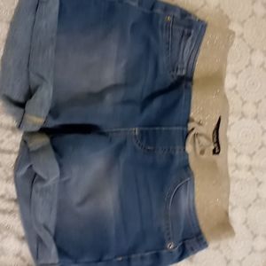 I am selling shorts with a rainbow shimmer elastic